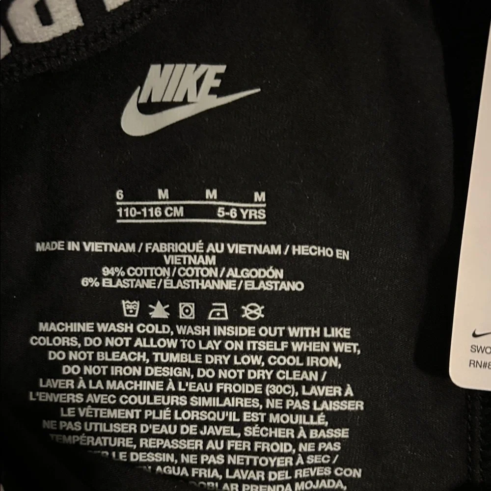 Nike Kids Black Leggings with White Swoosh